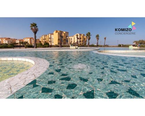 Bazén v ubytovaní « L’Ecume » Terrasse Rez-de-chaussée/Front de mer alebo v jeho blízkosti