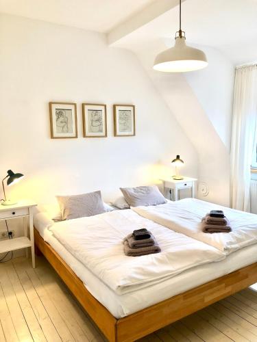 Кровать или кровати в номере Ferienwohnung Ludwigstrasse