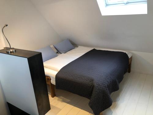 Кровать или кровати в номере Ferienwohnung Ludwigstrasse