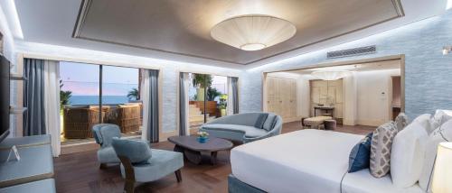 En eller flere senge i et værelse på Ela Excellence Resort Belek
