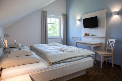 Postel nebo postele na pokoji v ubytování Schwarzwald Chalets