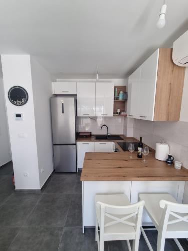 Η κουζίνα ή μικρή κουζίνα στο Apartman Smilja