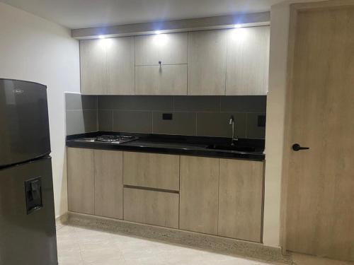 Een keuken of kitchenette bij ARRIENDO APARTAMENTO CENTRAL POR DÍAS PITALITO