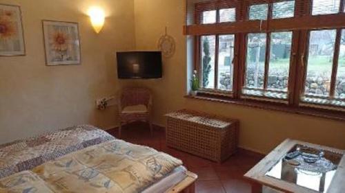 Postel nebo postele na pokoji v ubytování Ferienwohnung an der Elbe