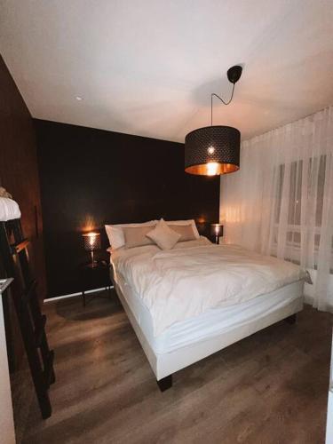 Postel nebo postele na pokoji v ubytování Luxury Apartment in Calm area