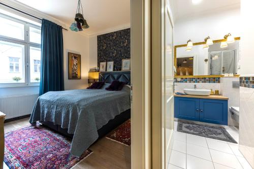Posteľ alebo postele v izbe v ubytovaní 3on7 Apartments