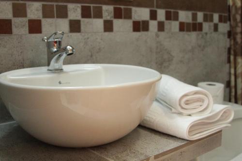 Un baño de Hotel Casa Sakiwa