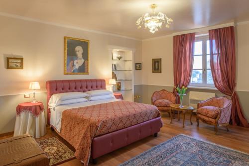 Postel nebo postele na pokoji v ubytování Palazzo Rotati