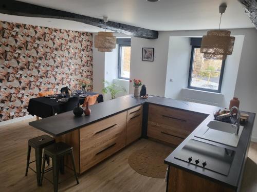 Zdjęcie z galerii obiektu Charmante maison près du canal w mieście Tinténiac