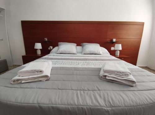 Postel nebo postele na pokoji v ubytování Costa Alcázares