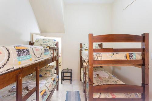 Двуетажно легло или двуетажни легла в стая в Casa charmosa e confortável no Porto Maravilha - quartos disponíveis conforme número de hóspedes