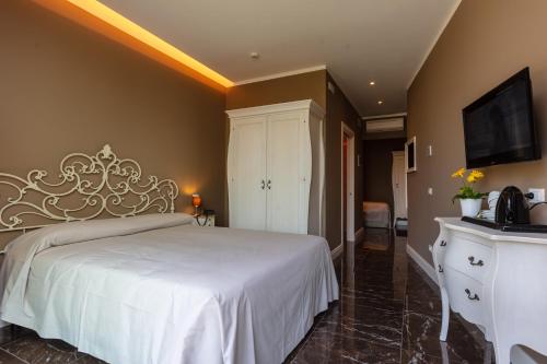 Postel nebo postele na pokoji v ubytování Art Hotel Ventaglio