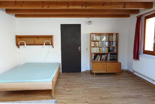 Posteľ alebo postele v izbe v ubytovaní Appartement dans vielle ferme au coeur des Vosges