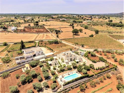 an aerial view of a estate with a swimming pool at Il Carpino in Martina Franca