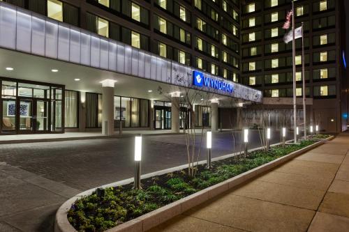 a building with a row of lights in front of it at Wyndham Philadelphia-Historic District in Philadelphia