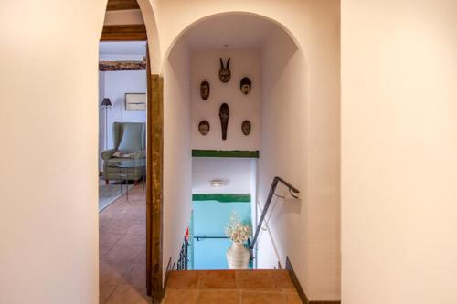 a hallway of a house with a pool in it at CASA RURAL, con Jacuzzi, Chimenea, BBQ, Bar y mucho mas in Almazán