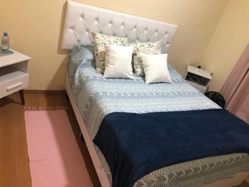 Cama o camas de una habitación en Apartamento Jaraguá