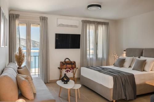 TV i/ili multimedijalni sistem u objektu Klio Seafront House, Sami Kefalonia