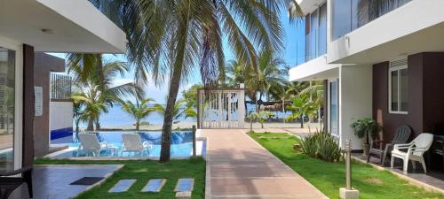 a view of the pool from the house at Casa frente al mar con piscina in Coveñas