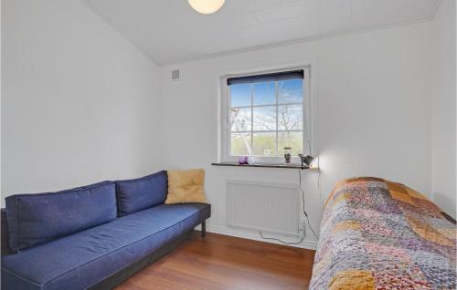 Amazing Home In Ørsted With Kitchenにあるベッド