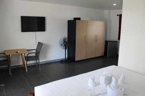 Μια τηλεόραση ή/και κέντρο ψυχαγωγίας στο Malipaj Apartments