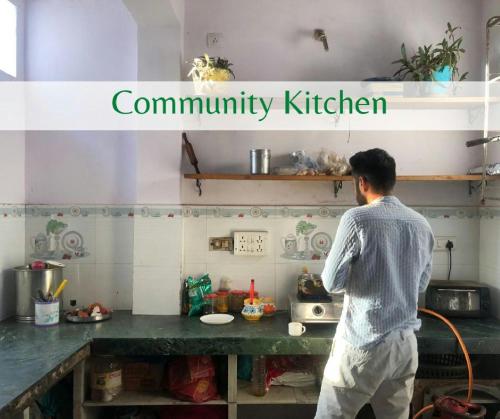 A cozinha ou kitchenette de Whereabout Hostel