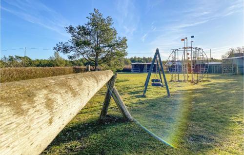 an empty playground with a slide and a play structure at Skomaker Stuga in Visby