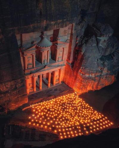 a model of a building with lights on the ground at Petra fort hotel in Wadi Musa