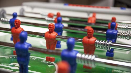 a group of plastic men playing a game of snooker at Hotel Casa Alpina - Alpin Haus in Selva di Val Gardena