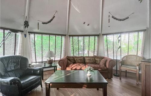 a living room with two couches and a table at Beautiful Home In Chaam With Wifi in Chaam