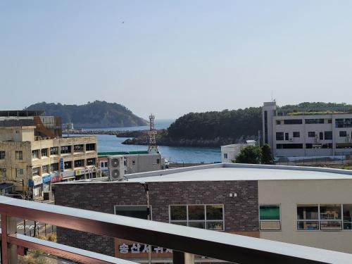 a view of a river from a building at BK Hotel Jeju in Seogwipo