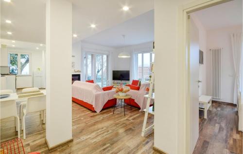 a living room with a couch and a table at Pet Friendly Apartment in San Bartolomeo