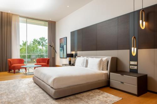 Hiddenbay Teos Hotelにあるベッド
