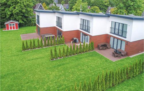 an aerial view of a house with a yard at Baltic Village in Damp