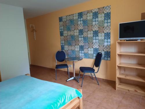 Телевизор и/или развлекательный центр в Hotel Wittenberg-Hotel Garni
