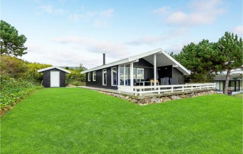 a house with a large lawn in front of it at Beautiful Home In Faaborg With Kitchen in Fåborg