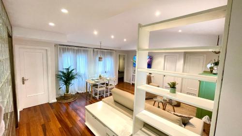 A bed or beds in a room at Auditorio parking gratuito www venaoviedo es