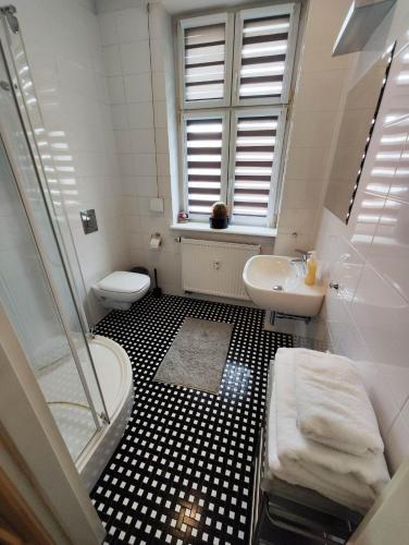 Ένα μπάνιο στο Apartamenty Duo