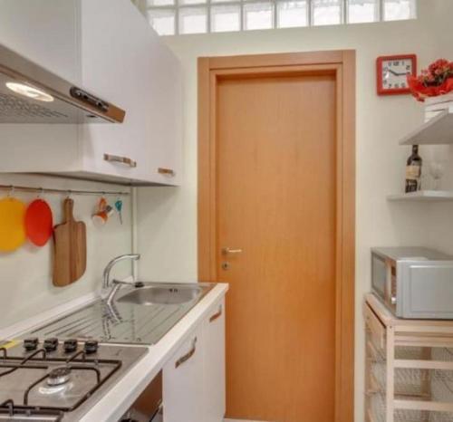 Kuchyň nebo kuchyňský kout v ubytování L'orchidea appartamento in Puglia