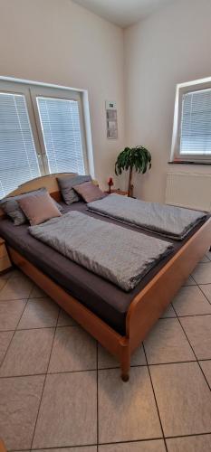 Postel nebo postele na pokoji v ubytování Apartman MURKO P-1