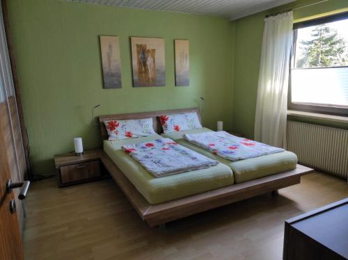 Ліжко або ліжка в номері Ferienwohnung Klaus