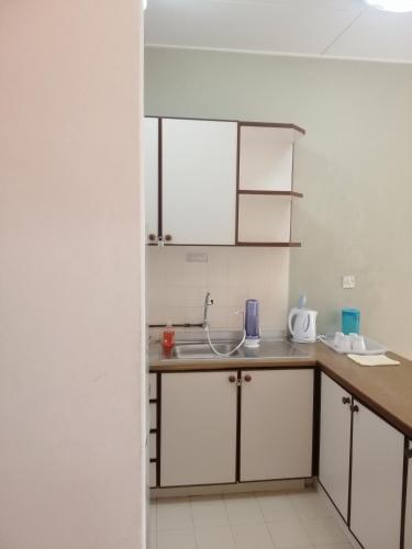 Η κουζίνα ή μικρή κουζίνα στο My Cozy Nest - Near Beach