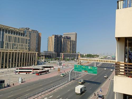 a view of a highway in a city with buildings at Silver Sand Hotel in Dubai