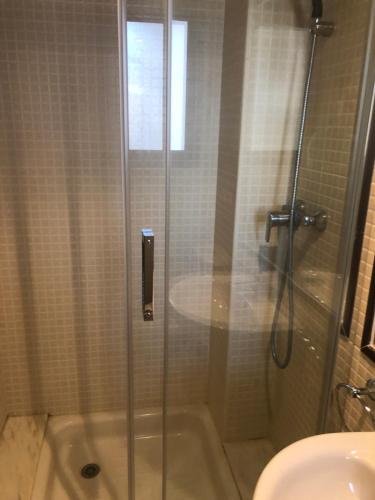 a bathroom with a shower and a sink at Amatista 11 a in Calpe