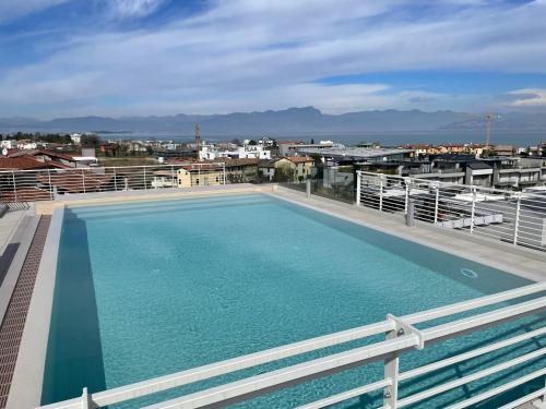 The swimming pool at or close to Opalia Residence - Stella Garda Lake Lifestyle