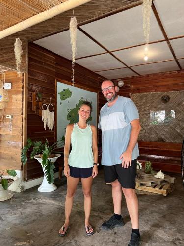 a man and a woman standing in a room at Bohol Island Homestay in Dauis