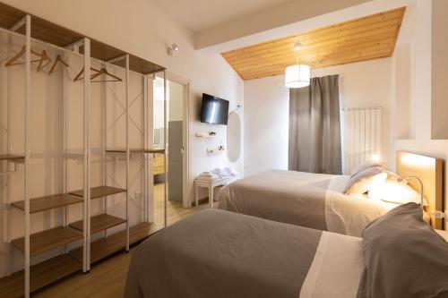 Postel nebo postele na pokoji v ubytování B&B La Camia