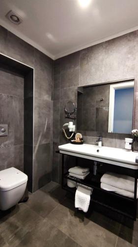 Ένα μπάνιο στο Skopea Inn Exclusive Hotel