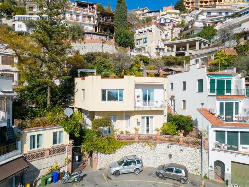 an aerial view of a city with houses at Villa Giannina B&B in Taormina