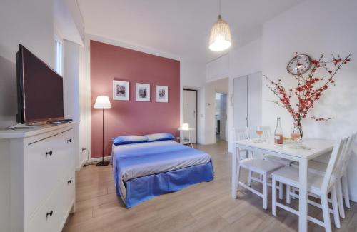 Ένα ή περισσότερα κρεβάτια σε δωμάτιο στο Margherita House